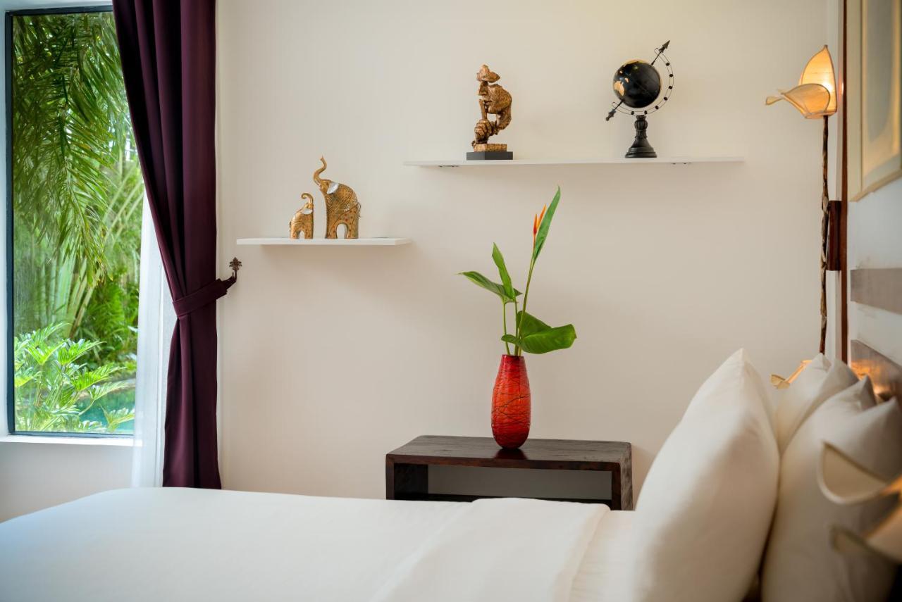 סיאם ריפ The Thirdfold Residence מראה חיצוני תמונה A bedroom at the hotel